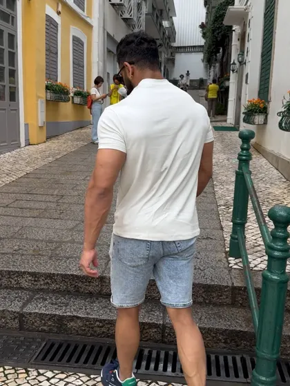 Even when exploring new cities, I stay active. A muscular build is noticeable even in casual clothes, a quiet testament to the work you've put in.