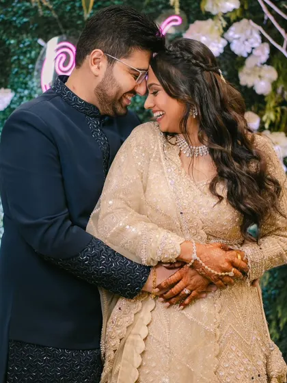 An adorable, happy photo of the newly engaged couple. Krisha's natural makeup lets her joy be the focus.