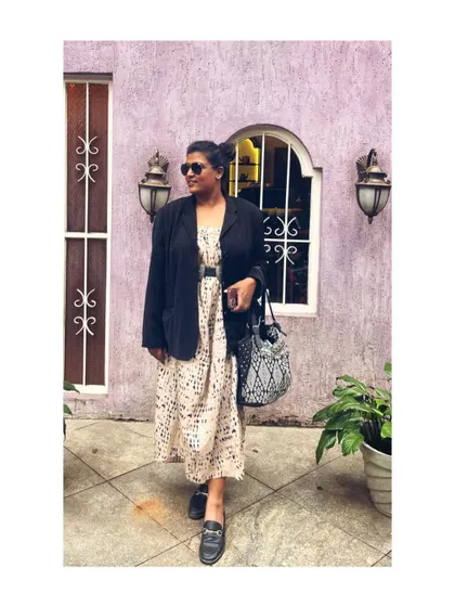 Another angle of my tea date outfit. The black loafers and blazer add a professional touch to the flowy dress, making it a versatile look for various semi-formal occasions.