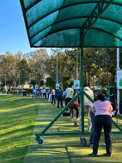 The back of the driving range line, showing how many players can practice simultaneously.