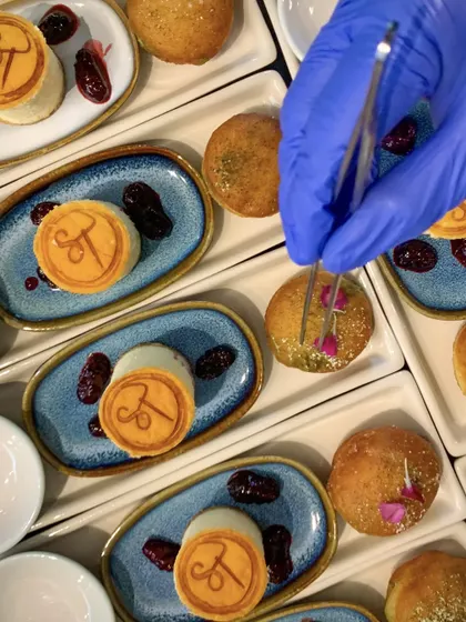A sweet throwback to a hot-pot luncheon. The dessert was a Japanese cheesecake and a miso custard bombolini, finished with my signature 'ST' logo.