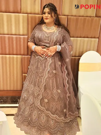 Another view of this client's gorgeous look, proving that a rented outfit can be absolutely iconic.
