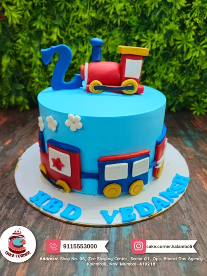 A colourful train cake for Vedansh's 2nd birthday. The simple and bright design is perfect for a young train lover's celebration.
