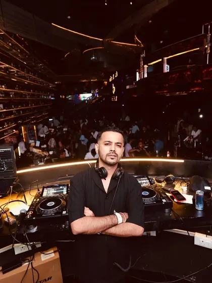 A moment of calm before the storm. Standing at my decks, ready to take the crowd on a journey.