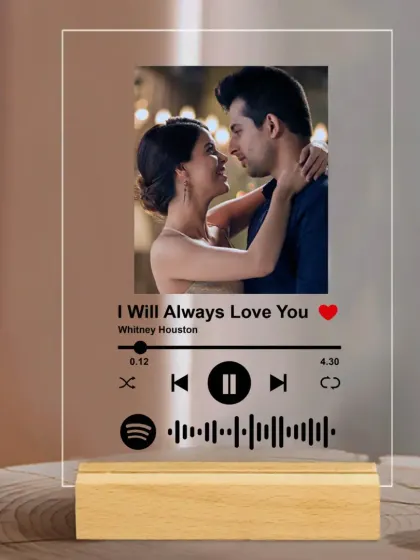 Turn your favorite song into a beautiful piece of decor with my personalized Spotify plaques. Just send me a photo and song title, and I'll create this acrylic plaque with a scannable code, mounted on a wooden base.