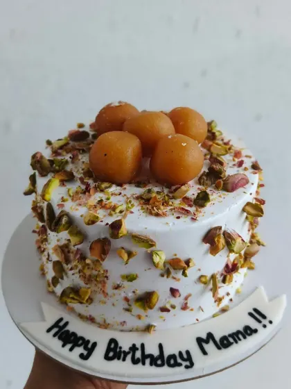 For those who love a desi twist, I present my Gulab Jamun cake. It's a delicious fusion cake with soft, syrupy gulab jamuns nestled on top and garnished with pistachios. It’s a crowd-pleaser at any family gathering or celebration.