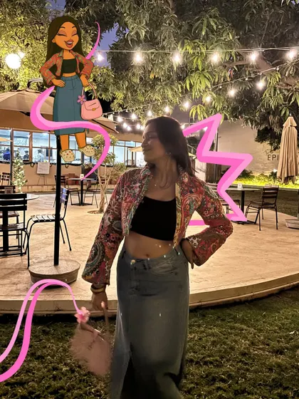 A night-out look with a cropped jacket, transformed into a Bratz-style illustration with bold colors and a starry background.