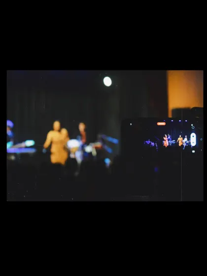 A view from the audience. It's cool to see what the show looks like from your perspective, with everyone's phones up recording the moment.
