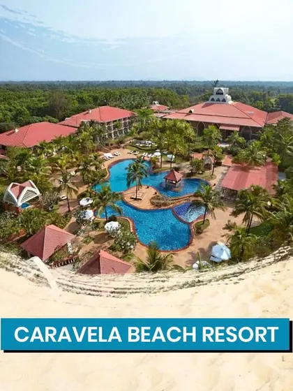 An aerial view of the sprawling Caravela Beach Resort in Goa, showcasing its beautiful pools and proximity to the beach.