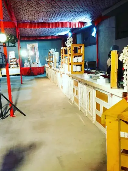 Another perspective of the themed counter setup, highlighting the decorative elements like the birdcage and the overall ambiance created for the event.
