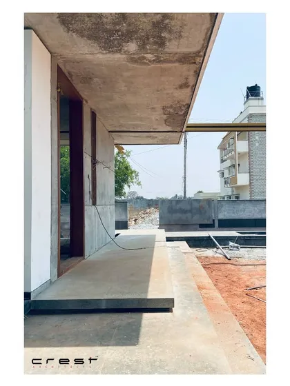 A cantilevered concrete slab at The Quarry House during construction, showing the raw, honest use of materials.