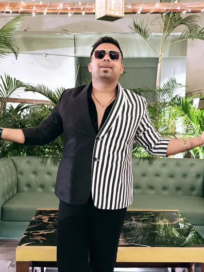 This half-black, half-striped blazer is one of my boldest looks. It's a conversation starter and perfect for making a memorable impression.