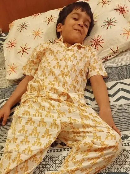 This little one looks so cozy and ready for bed in our yellow Giraffe print pyjama set. It’s one of our most requested animal prints for kids.