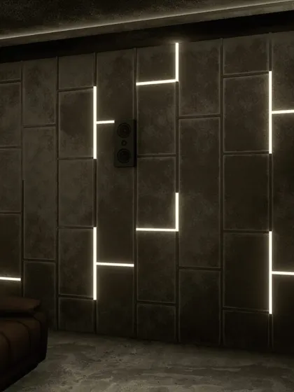 The geometric lighting pattern on the wall serves as both a beautiful design feature and a source of soft, ambient light.