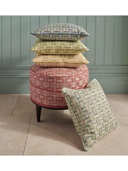 This basket-weave design is a stunning example of how a simple geometric pattern can create a high-impact look. I use such upholstery fabrics for ottomans and cushions to add texture and a pop of colour.