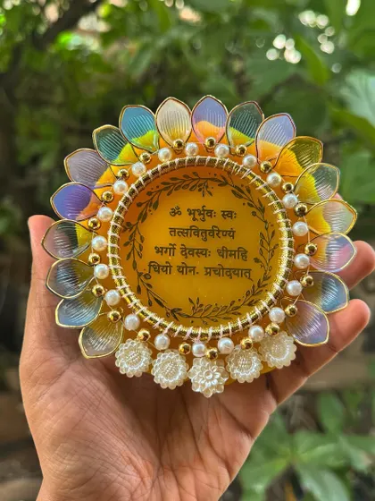 Divine artistry in resin. This handcrafted piece features the sacred Gayatri Mantra, blending devotion and design.