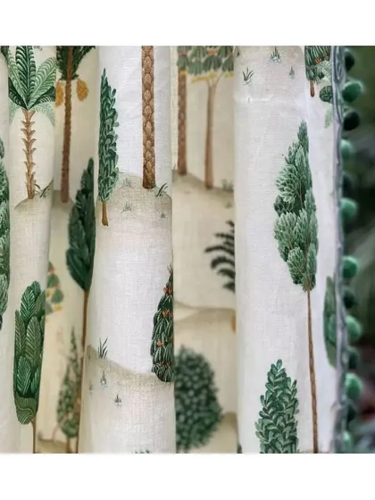 This linen fabric features stylized Indian trees in shades of green with golden accents. It's a perfect choice for drapery or upholstery to add a touch of elegance and a nod to Indian artistry in any space.