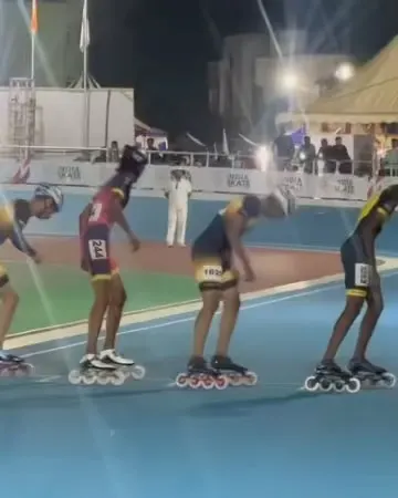 The tense moments before the start of a national championship skating race. Our athlete is poised and ready for action.
