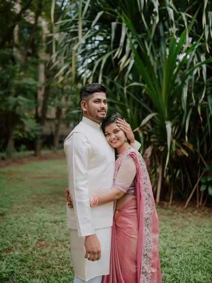 A warm and loving hug captured during an outdoor engagement session.