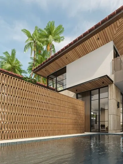 Another view of the Guirim villa, highlighting the terracotta screen that encloses the pool area. This feature not only ensures privacy but also creates beautiful patterns of light and shadow, enhancing the architectural character.