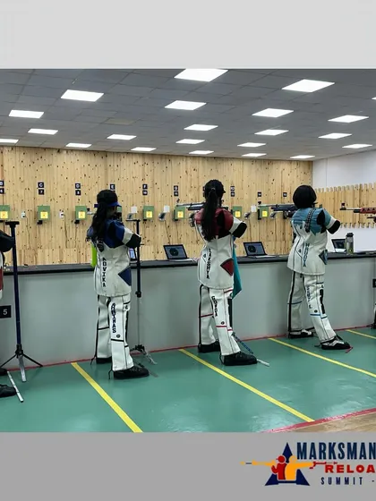 A wide view of our 16-lane ISSF standard shooting range during the Marksmanship Summit. Shooters are in full gear, demonstrating the professional environment we provide for every national-level air rifle and air pistol competition.