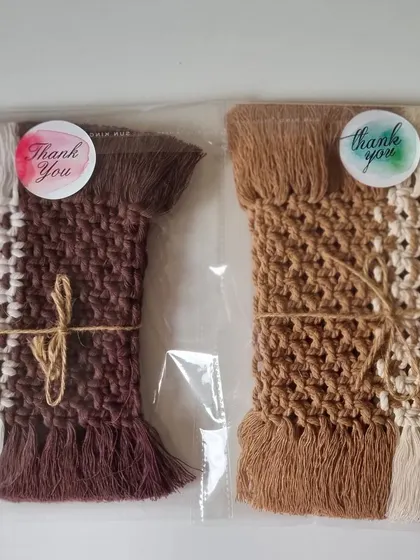 Two different colorways of my rectangular coasters, packaged and ready to go to their new homes.