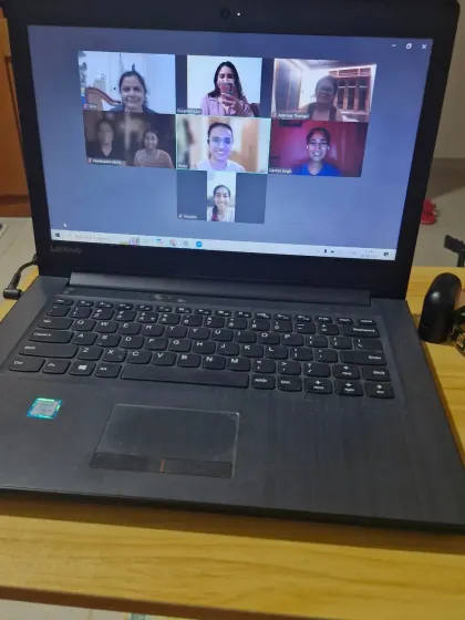 A glimpse into one of our online group yoga classes. We connect from all over, creating a supportive community right from our homes. You can see the smiles and focus, which is what our virtual shala is all about.