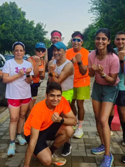 Smiles after the miles. This group just finished a tough session, proving that consistency is the key to getting stronger every week.