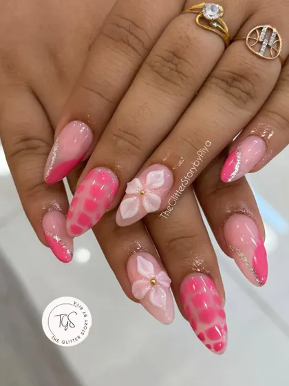 A playful and vibrant bridal set in shades of pink. This design includes a trendy crocodile print, silver glitter accents, and delicate 3D flowers for a fun and modern bride.