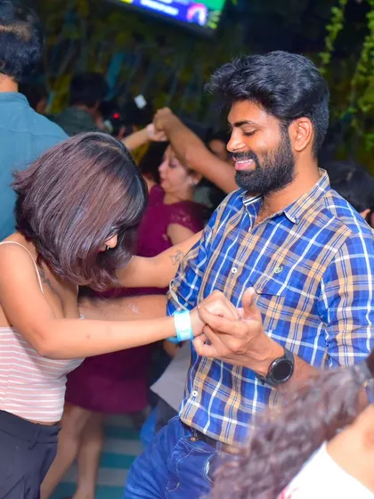 A moment of laughter and fun during a dance.