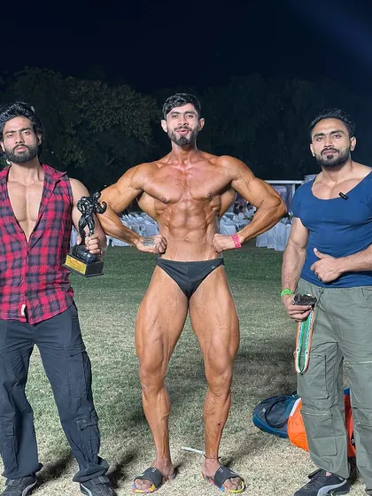 Posing with the team. Success is a team effort between the coach and the athlete.