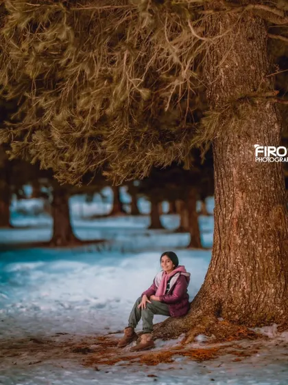 A wider shot of my daughter resting by the tree, with some creative color grading to enhance the mood. Personal projects like this help me grow as an artist.