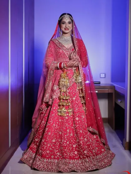 So elegant and graceful. This bride's pink and red lehenga was so unique, and I created a soft makeup look to match its beauty.