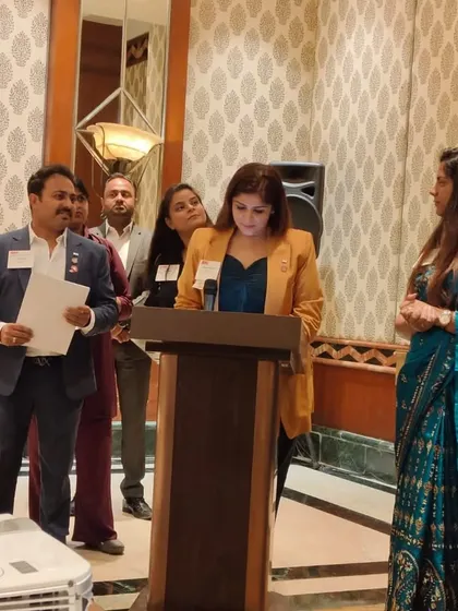 Speaking at a BNI event, embracing the opportunity to lead and inspire.