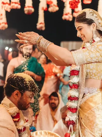 The 'Talambralu' ritual, where the bride and groom shower each other with rice, a beautiful and playful South Indian tradition.