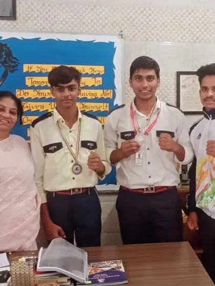 Our boxers with their school principal, showcasing the medals won at the Delhi School State competition.