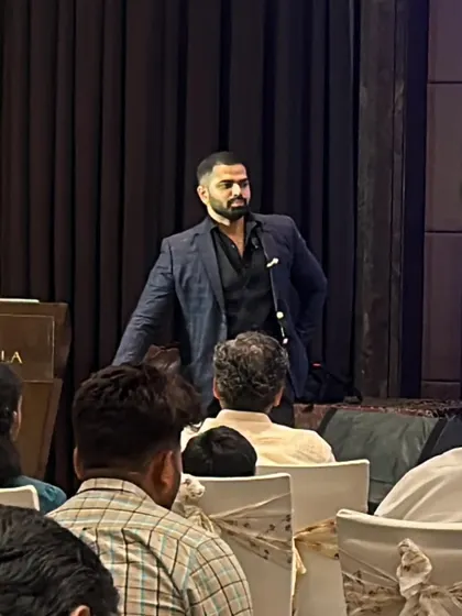 Addressing the audience during an intimate corporate event. In these settings, I can share more detailed stories and psychological insights.