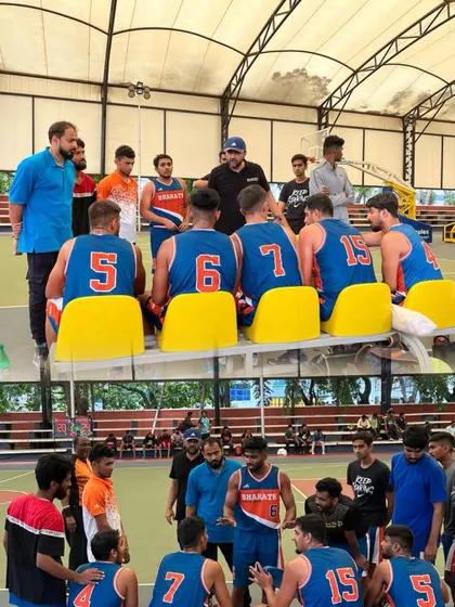 A timeout huddle during the 2023 State 'A' Division league. Communication and strategy are just as important as physical skill, a key focus in my team coaching sessions.