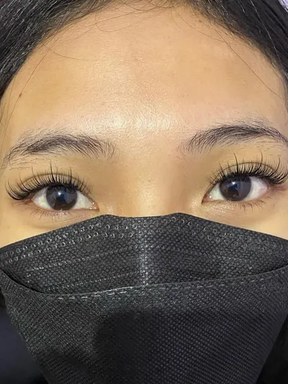A perfect example of an Anime lash set. This style uses defined, spiky sections of lashes to create a unique, doll-eyed look inspired by manga and anime characters.