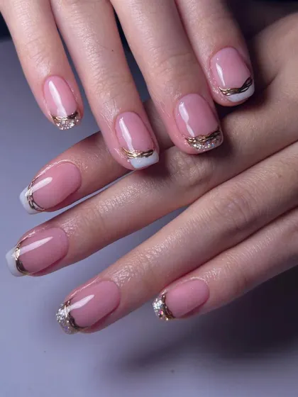 Another look at our gold glitter French manicure, perfect for weddings, parties, or any time you want to feel a little extra fancy.