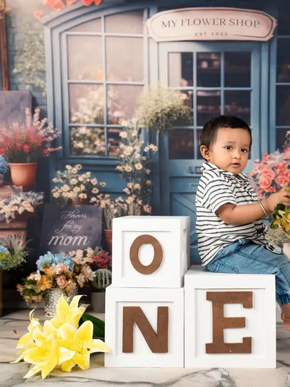 A different outfit for the flower shop theme. Sitting on the "ONE" blocks, this little guy looks so handsome and grown-up.