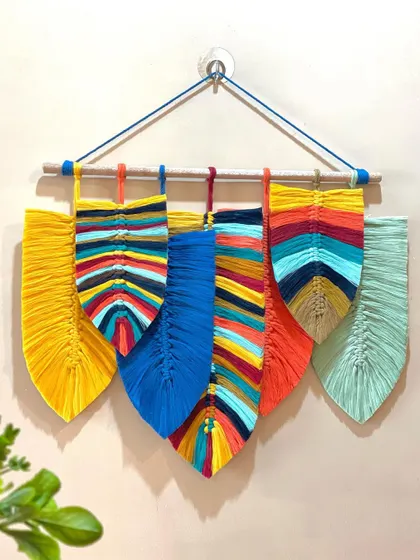 This piece was a custom recreation of a design a client loved. The mix of solid and multi-colored leaves creates a dynamic and artistic effect.