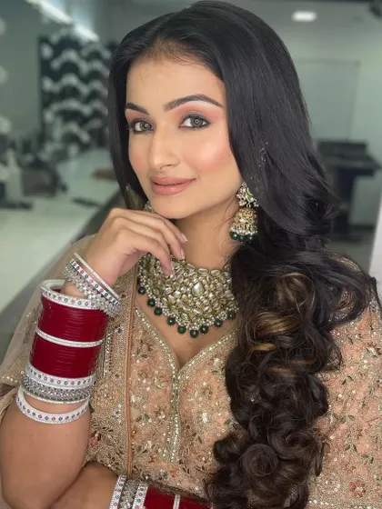 The addition of the chooda completes this look. Understanding the entire bridal ensemble is part of becoming a true bridal expert.