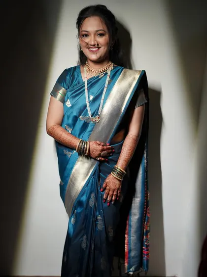 A full-length view of Shivali's stunning engagement attire. My makeup and hairstyling complete her elegant and traditional look.