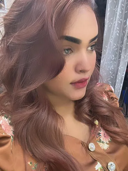 A stunning transformation from boxed color to this beautiful, warm rose-brown hue. This shows that even difficult corrections can have amazing results.