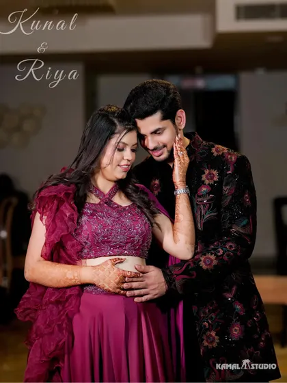 A romantic portrait of Kunal and Riya at their Mehendi, capturing a tender moment between the couple.