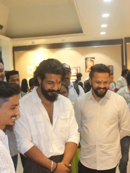 Interacting with guests and fellow artists at the Kalangan Art Exhibition.