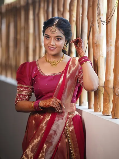 Another beautiful portrait. The soft, natural makeup enhances her features without overpowering them, creating a look of timeless elegance for her traditional ceremony.