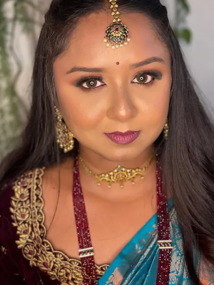 A close-up of my Deepawali makeup. I went for a dramatic eye with a deep berry lip, paired with traditional jewellery.