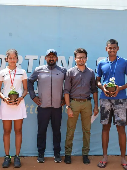 The finalists of the AITA CS 3 U18 tournament with our founder and an event official. We are hands-on in our event management, ensuring quality from start to finish.